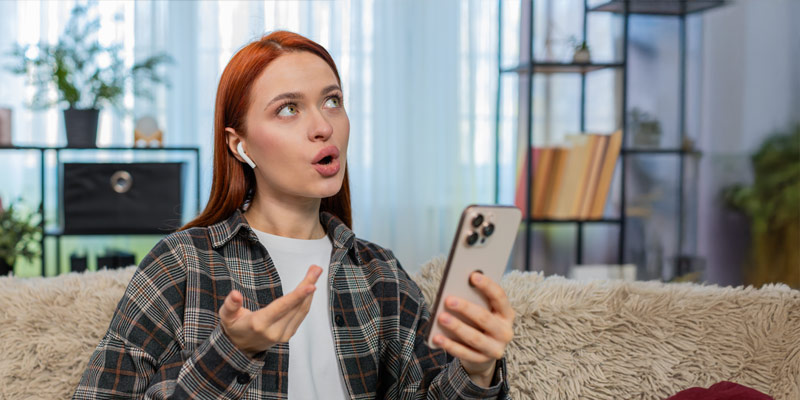 Woman learning a language with an app and doing some listening and speaking exercises