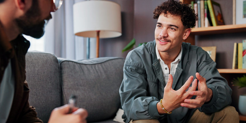Two people engaged in a meaningful conversation at home