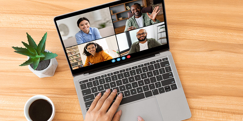 Virtual language course on a laptop showing real-time interaction and communication beyond language learning apps