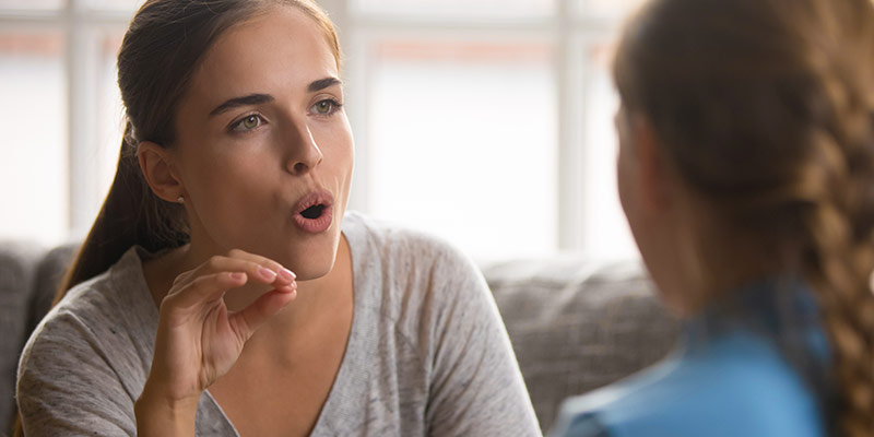 Woman practicing pronunciation and speaking skills