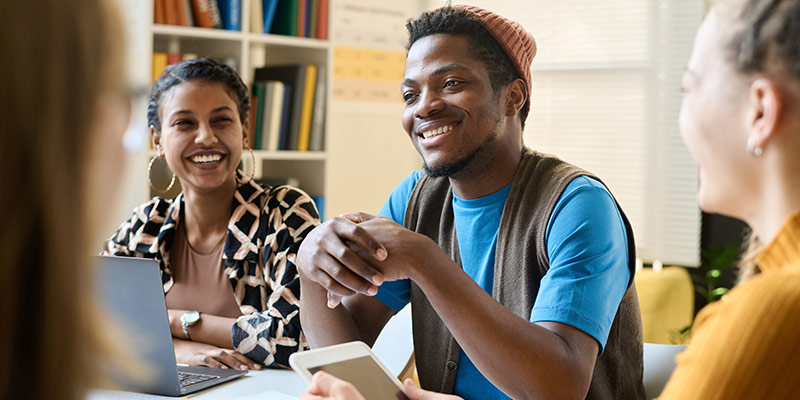 Engaged learners in a language course, highlighting the social and interactive benefits of real language learning
