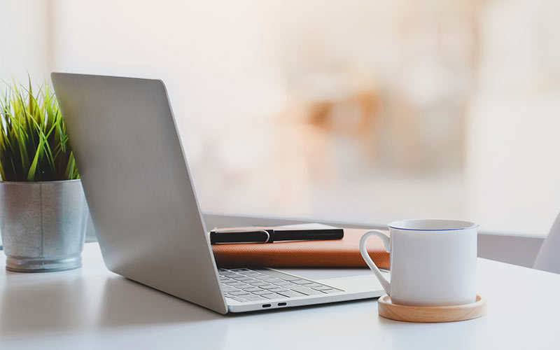 Professional building language confidence through structured learning and real-world communication practice, contrasted with an empty workspace that reflects the limits of passive improvement
