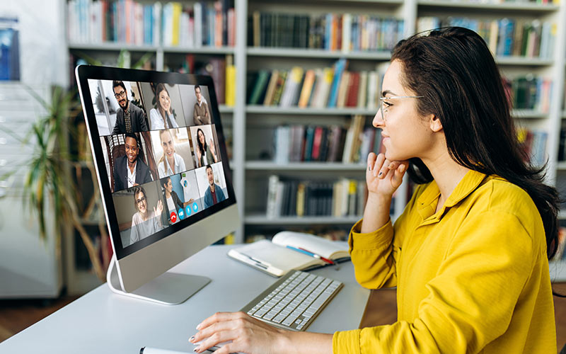 Learner engaging in an interactive online language class with real-time communication and feedback