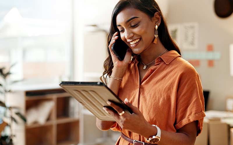 Professional communicating confidently with a client, illustrating the importance of clear communication in business relationships
