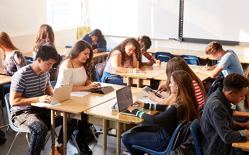 Language learners combining classroom study with digital learning as part of a hybrid programme