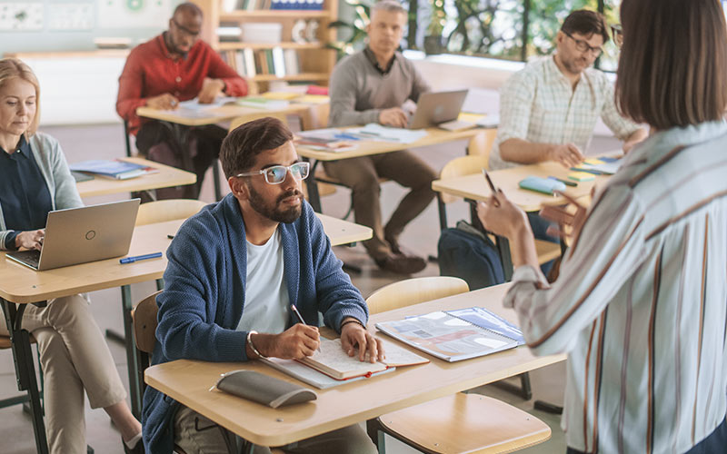 Corporate learners participating in a professional language class