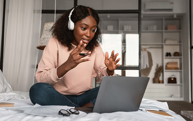 Learner attending an online language lesson from home 