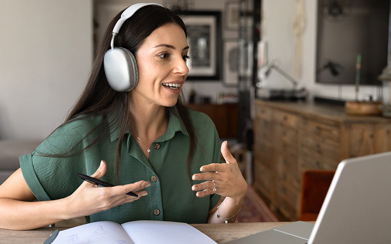 Learner actively speaking and communicating during a virtual language class