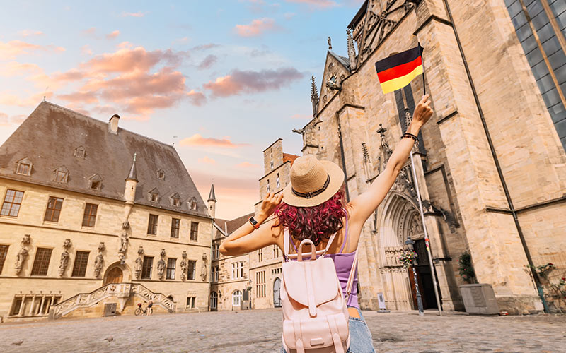 Learner using her German language skills while travelling in Germany
