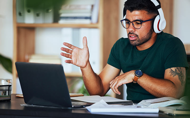 Learner taking part in an interactive online language class with live speaking practice