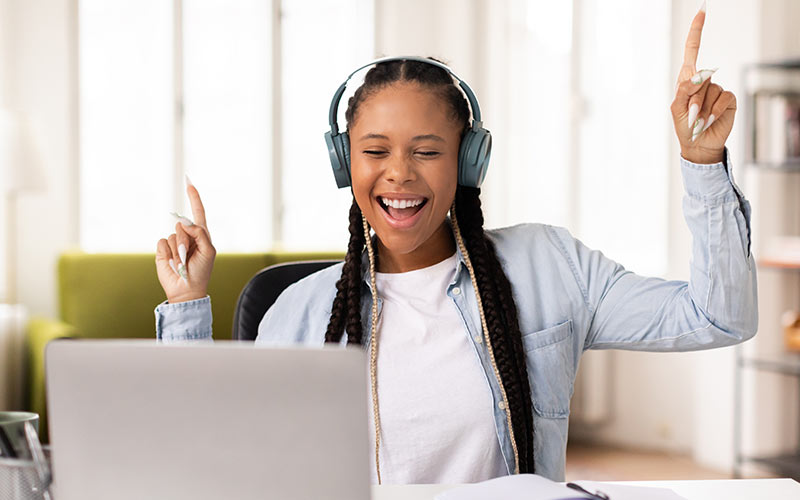 Happy learner feeling confident and motivated during an online language lesson
