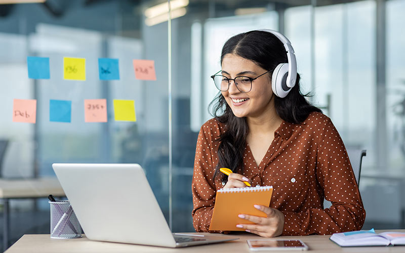 Learner taking part in an online language lesson at a time that fits her schedule