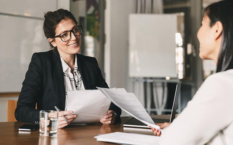 Professional practicing communication skills during a career-focused language coaching session
