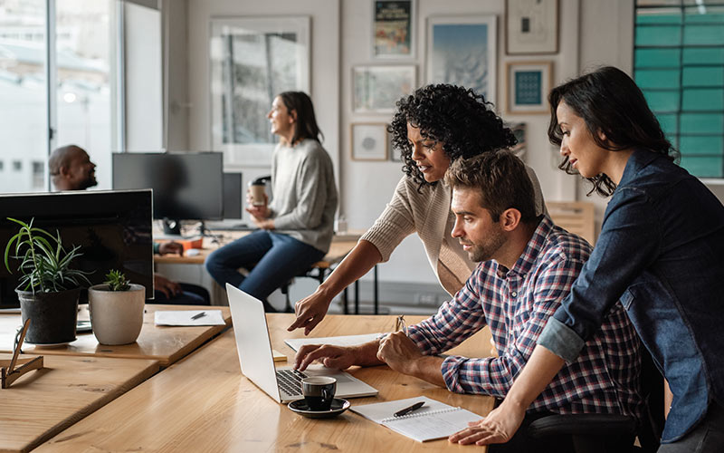 Business team collaborating and communicating effectively in a modern workplace
