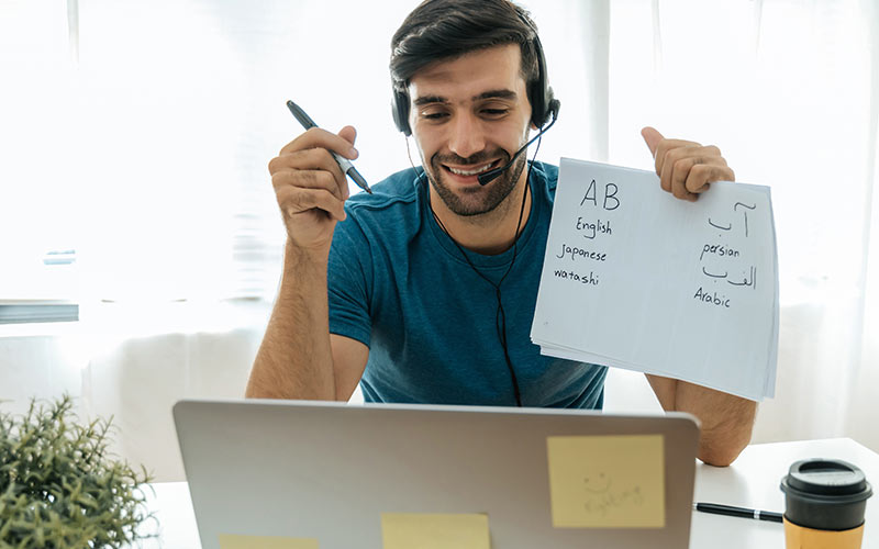 Language trainer teaching a live online lesson with interactive speaking practice