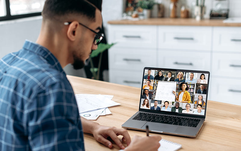Professional participating in a flexible virtual language class from home