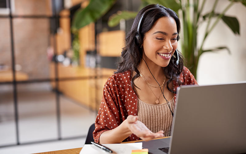 Learner practicing real conversations online to improve speaking confidence