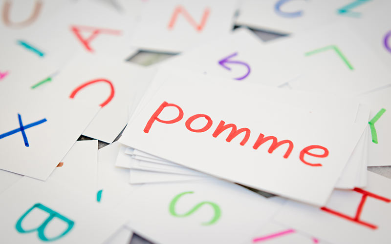 Colorful letter cards introducing children to the french language and alphabet