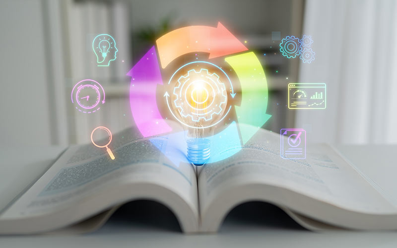 Open book with a glowing light bulb and circular digital arrows, symbolizing continuous learning and long-term language progress